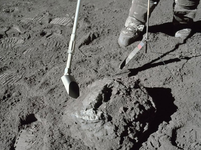 Astronaut collecting sample 78235 