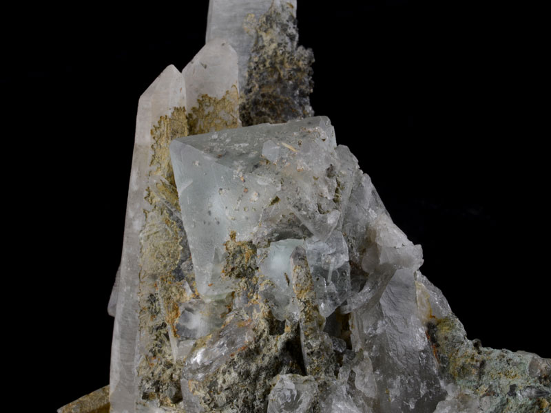 Fluorite octahedron on quartz cluster, 6.5 cm across